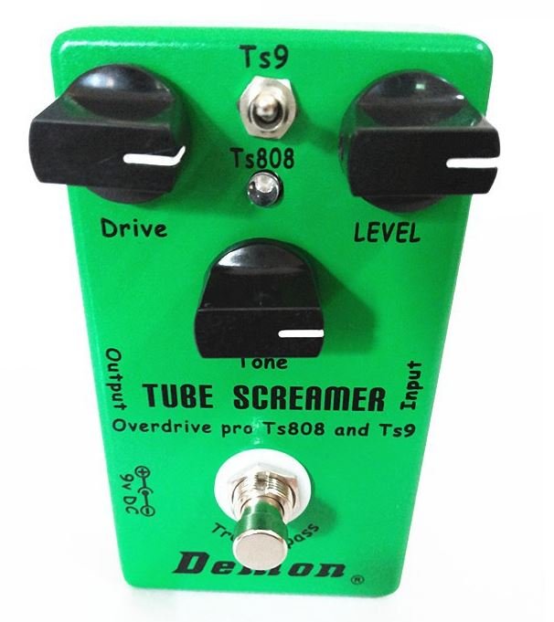 Ibanez Tube Screamer Clone - Affordable Classic Overdrive Tone Ibanez Tube Screamer Clone. The problem we face in commerce is as soon as a product become famous, the price gets incredibly high. Guitar pedals, even more than an electric guitar, are built with few dollars of equipment. We are paying for the brand and of course the creativity of the product; Clone Pedals Even if I consider normal to pay for the intellectual property, I find the price they are charging ridiculously high when you know the cost of components included. Especially for a factory that buys them by the tons. You can make your own Ibanez Tube Screamer Clone for peanuts if you are willing to invest in parts and time to do it. As I say in the video, if the circuit board and components used are the same, it can't be a different product. There are tons of free schematic online you can get to build any pedal and get the same outcome. Overdrive and distortion pedals are exceptionally easy to make. Effects such as chorus or delay are much harder to assemble, but a distortion pedal can be constructed in few hours if you know how to solder properly. Problem making your clone The only issue I have making pedal clone is; with every effect you need specific components. Even if I buy them cheap at Aliexpress, you can't buy one capacitor or one resistor at a time, so you end up buying 1000s of each value to use them maybe once in a while, or never again. Especially if you intend to build clones for your use only, the massive amount of components ends up overwhelming. Buying ready make kit is not attractive. The price of it is higher than the purchase of a ready-made clone. Buying a kit is fun only if you like building pedals. It's quite easy, and you can make your art and look of the casing. Selling Clone Also selling clone on eBay and alike is not a successful business plan. You won't be able to be competitive with Chinese factories who are making a much better job. When you are making clones, you are using handmade PTB. Companies are making their printed circuit board. The result is much more professional and stable. The Ibanez Tube Screamer Clone Ibanez Tube Screamer Clone is the way to go to get an identical tube screamer pedal for a fraction of the price. You won't have to fear customs issue since it's not a fake Ibanez pedal but a Demon. If you don't mind having the brand name Demon plastered on the pedal instead of Ibanez, you can have a Tube Screamer for 36$ shipping included. TS9 and the TS808 versions They also included the two popular version of the pedal into the same box. The TS9 and the TS808. As demoed in the video the difference between the two is so minimal that nine times out of ten you can't hear the difference. Despite the lack of contrast, I prefer the TS9 version. I think there's more output than the TS808 mode. You can set the same sound in the TS808 by boosting the gain and volume, but it gets a little noisier than the same sound laid down in the TS9 mode, despite the pedal being exceptionally silent compared to other overdrives. Difference between the TS9 and the TS808 When I first tested the pedal I had a bigger discrepancy in volume and tone between the two modes. It depends on the guitar used and the overall setting. In the video, I just used a Cathedral reverb and the Tube Screamer. Sound beeing all about frequencies, the outcome is going to be entirely different is you add other effects in the chain, like a phaser or a flanger. Then the difference between the two available setting is going to be bigger. How I use my Pedals Personally, I set my stompboxes once and for all, and depending on the guitar used, the sound is different. That's why I demoed the effect using three distinct type of pickups. A vintage strat with passive single coils, an SG with humbuckers and another strat sporting active EMG pickups. Different Overdrive Sounds I have three sources of overdrive; that let me set three different tones. I use the lead channel of my amps for a fat crunchy sound, my Soul Fool for an almost clean overdrive sound, and my Ibanez Tube Screamer Clone for a brighter tone. I boost any of these setting using either my Centaur clone or a compressor. I can also use the Soul Food to boost the Tube Screamer or my amp's lead channel. It all depends on the type of pickups used and the sound I want. Low pickup output delivers a bluesy sound; high pickup output renders a heavier sound. Because I have built a lot a different guitar owning totally different wiring, there's always a guitar that does not sound too good with an individual setting. I just don't use it on that guitar instead of editing the effect. Link to buy the Ibanez Tube Screamer Clone If you want the real Ibanez Tube Screamer Please send me your two cents if you have anything to add or ask about the Ibanez Tube Screamer Clone. 